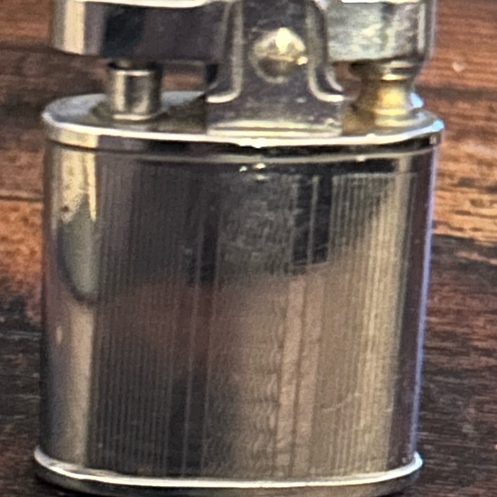 Silver Automatic Excello Shurlite.